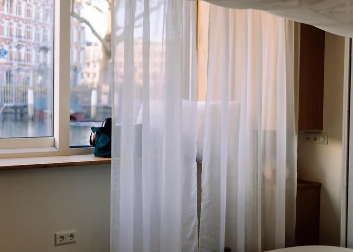 Hotel en barco The Houseboat Family - De Jordaan Brand New Houseboat!